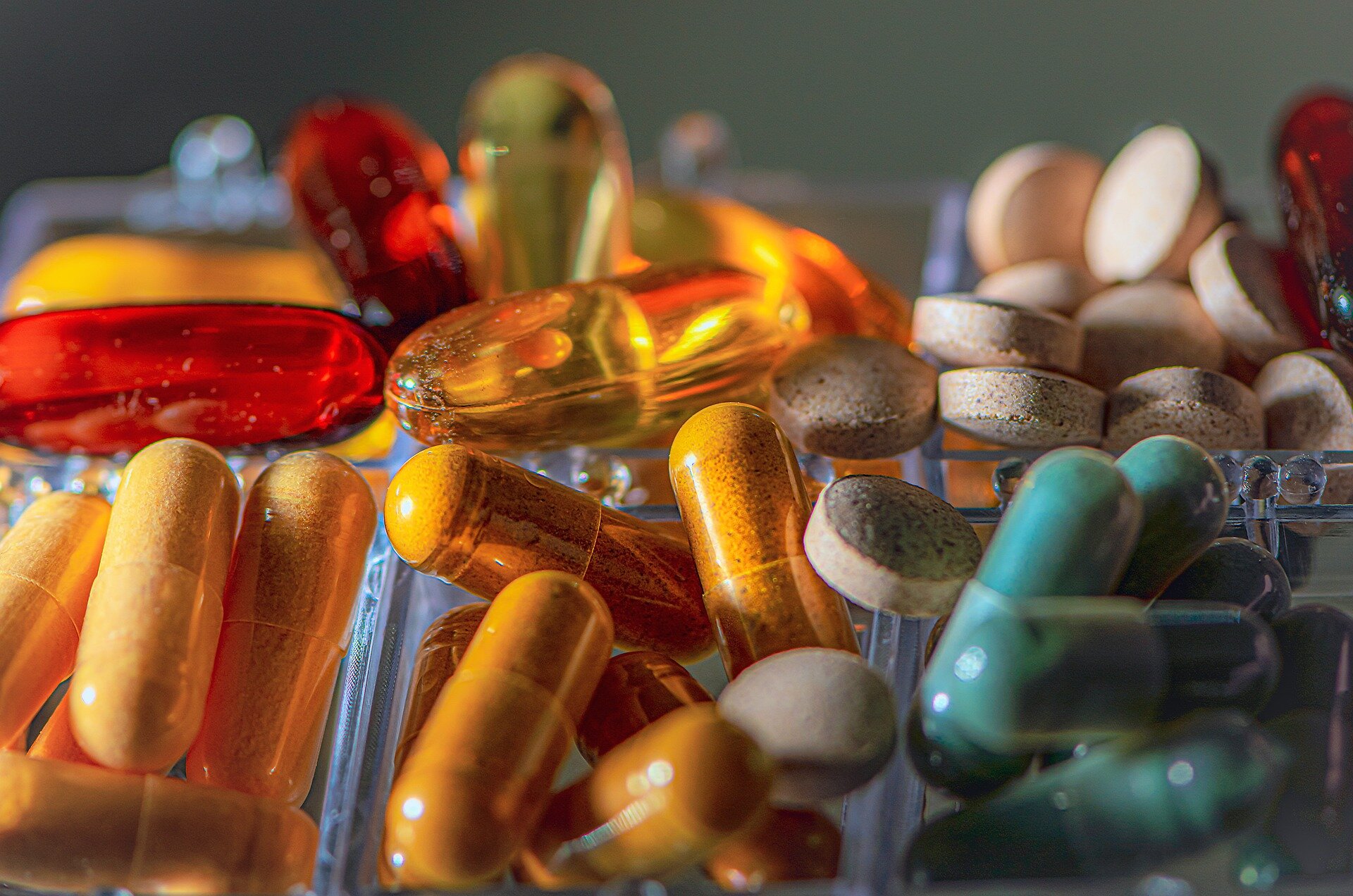 How are vitamin supplements made and is it better to get vitamins through food instead?